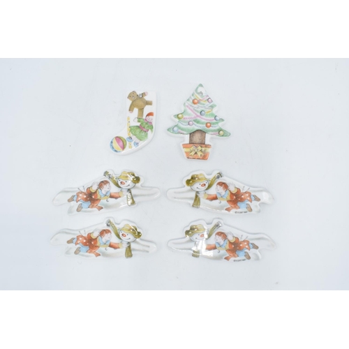 118 - A collection of Royal Doulton Snowman Christmas tree ornaments (6) In good condition without any obv... 