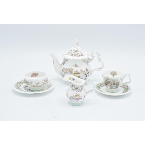 122 - Royal Doulton miniature Brambly Hedge tea set to include tea pot, milk, sugar, plate an a do (6) In ... 