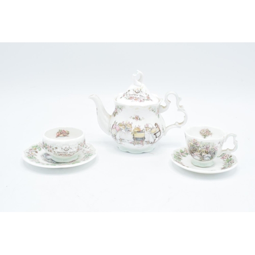 122 - Royal Doulton miniature Brambly Hedge tea set to include tea pot, milk, sugar, plate an a do (6) In ... 