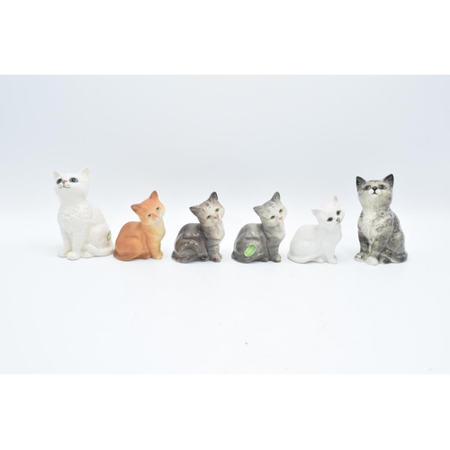 149 - A collection of Beswick to include Kitten 1886 in grey and white and model 1436 x 4 to include 2 x g... 