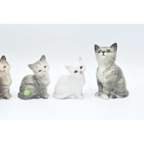 149 - A collection of Beswick to include Kitten 1886 in grey and white and model 1436 x 4 to include 2 x g... 