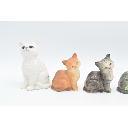 149 - A collection of Beswick to include Kitten 1886 in grey and white and model 1436 x 4 to include 2 x g... 