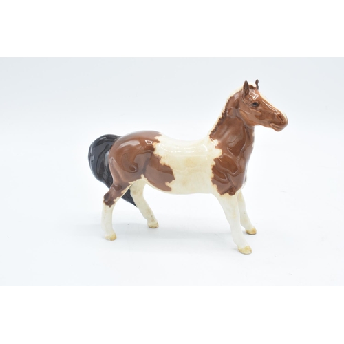 152 - Beswick brown Welsh Cob  1793 and skewbald girls pony 1483 (a/f) (2) In good condition without any o... 