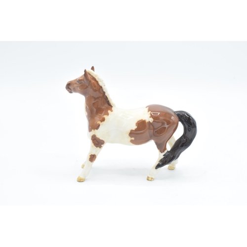 152 - Beswick brown Welsh Cob  1793 and skewbald girls pony 1483 (a/f) (2) In good condition without any o... 