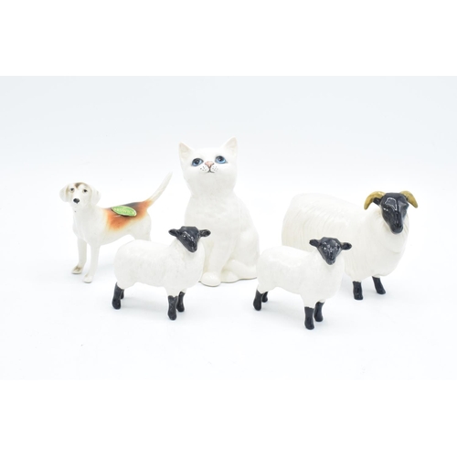 159 - A collection of Beswick to include a foxhound, kitten, ewe and 2 lambs (5) One lamb is chipped and h... 