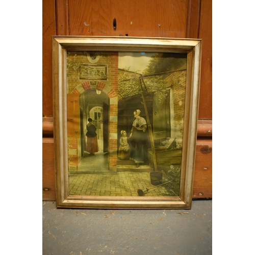 164 - A 20th century reproduction print of 'Courtyard of a House in Delft' by Pieter de Hooch. Print has w... 