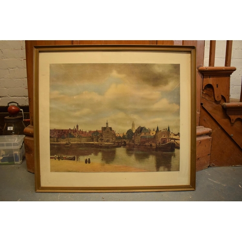 166 - Large 20th century reproduction print of 'View of Delft' by Johannes Vermeer. The frame has a crack ... 