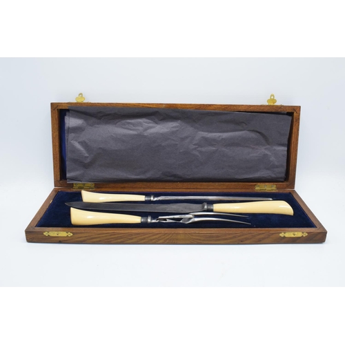 204 - Cased John Sanderson silver collared carving set with cast steel blades/ shanks, hallmarked for Shef... 