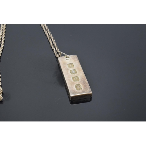 208 - Silver ingot pendant on silver chain, hallmarked for Edinburgh 1977 (34.5 grams)