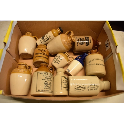 22 - A collection of stoneware miniatures to include Zummerzet Cider, Taylor's Mustard and Magic Jet Stai... 