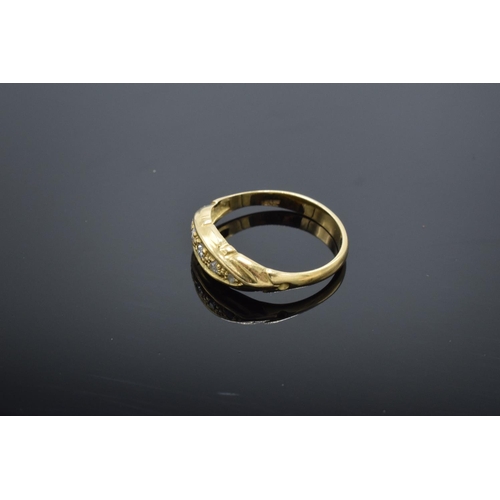 223 - 18ct gold ring with 5 illusion set diamonds, stamped 18ct. 1.9 grams total weight.