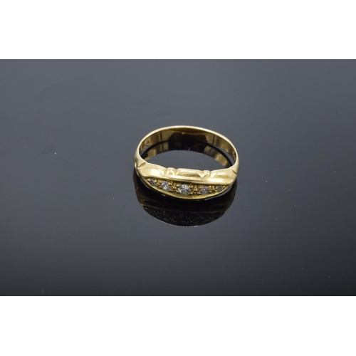 223 - 18ct gold ring with 5 illusion set diamonds, stamped 18ct. 1.9 grams total weight.