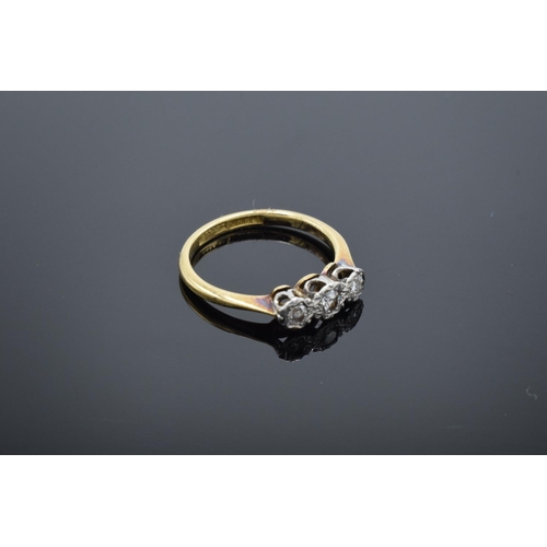 224 - 18ct gold and platinum 3 stone ring with illusion set diamonds, 2.8 grams total weight.