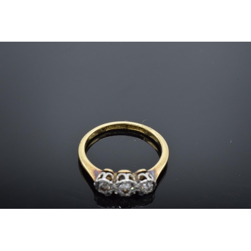 224 - 18ct gold and platinum 3 stone ring with illusion set diamonds, 2.8 grams total weight.