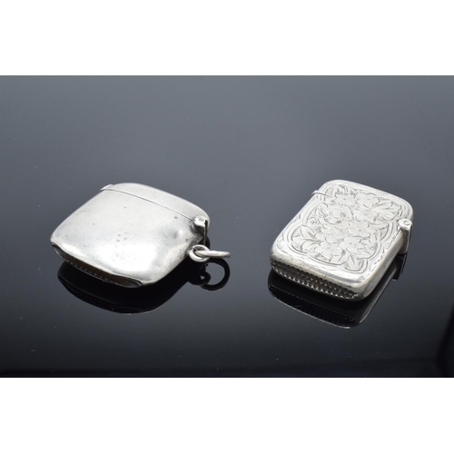 225 - A pair of Silver vesta cases, hallmarked for Birmingham 1899 and Birmingham 1910. 41.6 grams total w... 