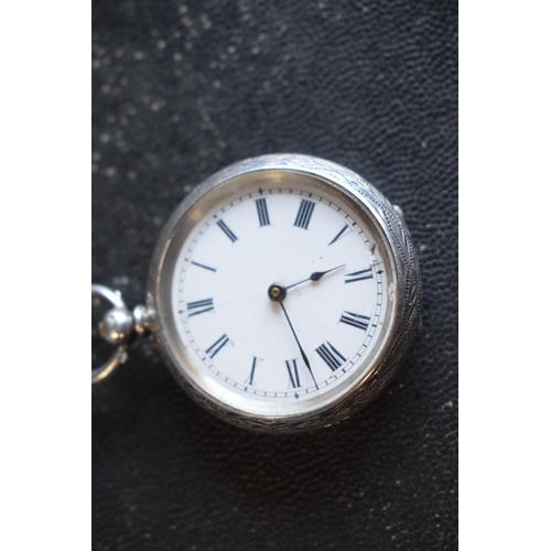 226 - Silver ladies fob watch, hallmarked for Birmingham 1886. Untested as without a key, some scratching ... 