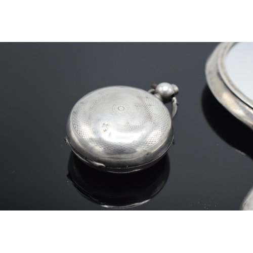 233 - Silver sovereign case (Chester, date mark worn) together with a small silver mirror (Birmingham 1912... 