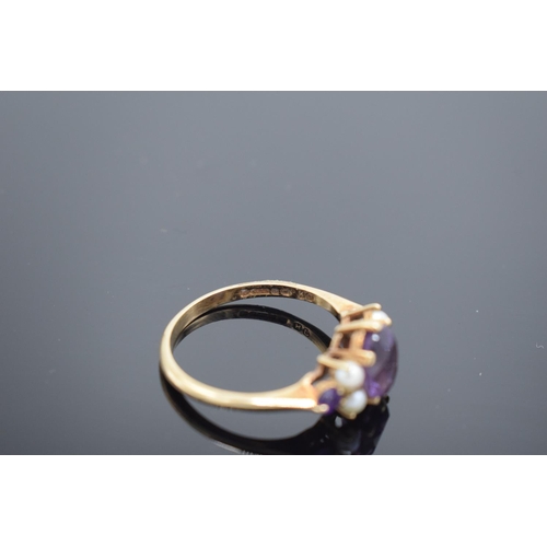 238 - 9ct gold ring with amethyst and pearl (hallmarked), gross weight 2.4 grams.