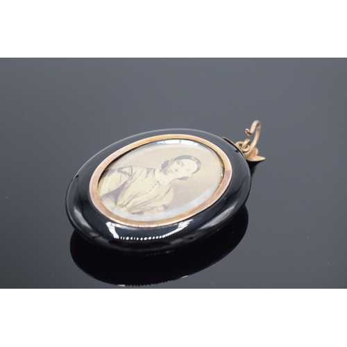 240 - Victorian jet and pearl locket-back mourning pendant, 6cm.