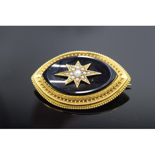 242 - Victorian 15ct gold and pearl star mourning brooch. Some minor dents and scratches.