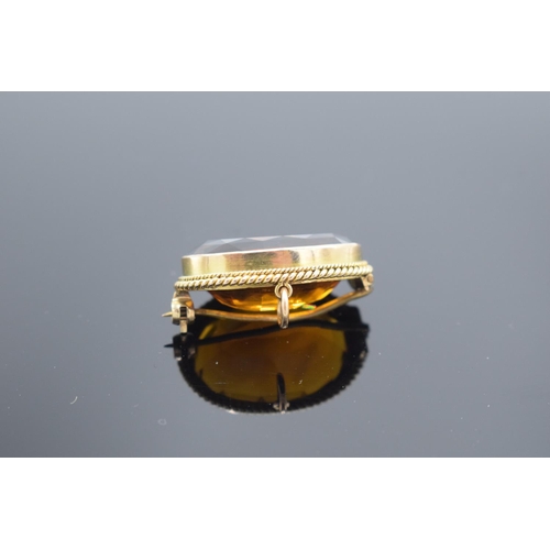 243 - Victorian gold citrine brooch, gross weight 9.1 grams.