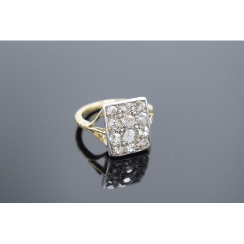 244 - 12 stone diamond ring appx 1ct: Set in yellow coloured metal, old ct hallmark partially rubbed, but ... 