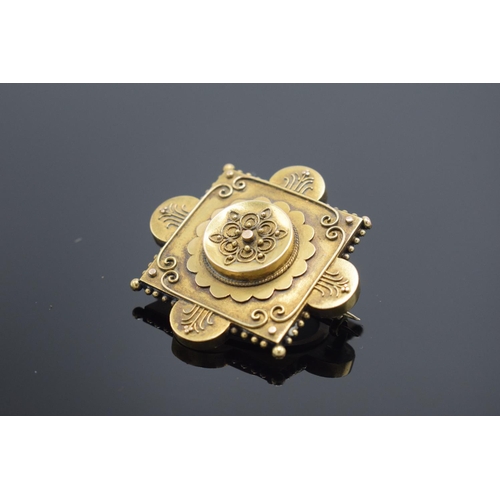 246 - Victorian 15ct gold brooch with a locket on the reverse. 8.2 grams gross weight.