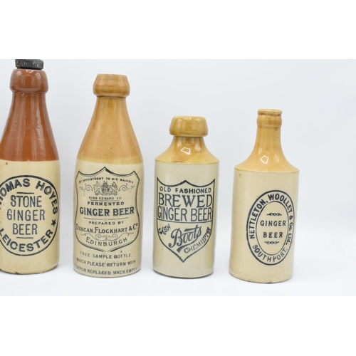 25 - A collection of ginger beer bottles to include Thomas Hoyes, Flockheart, West Macott, Boots, Dumfrie... 
