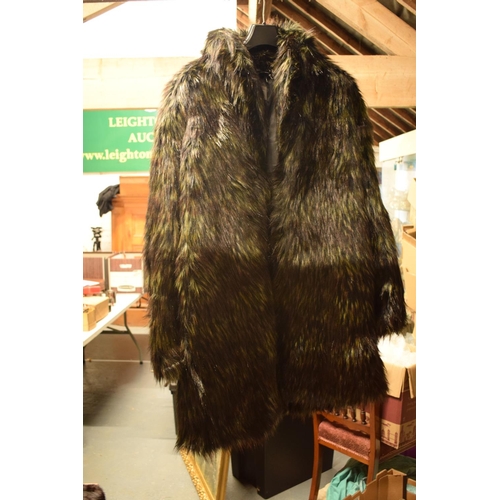 286 - Faux wolf fur coat together with a Coney fur coat (2)