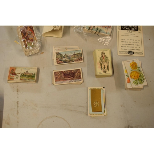 298 - A collection of 20th century cigarette and tea cards to include silk examples, Wills etc (mainly WWI... 