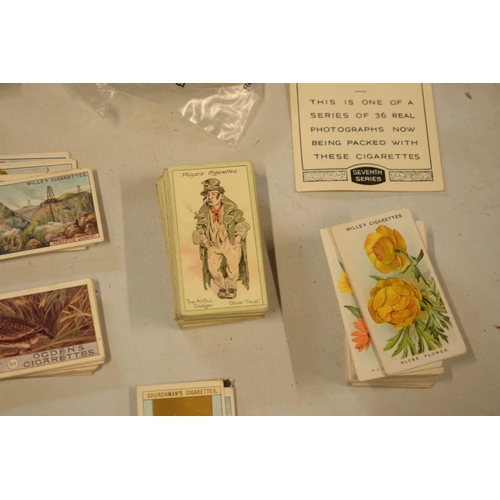 298 - A collection of 20th century cigarette and tea cards to include silk examples, Wills etc (mainly WWI... 