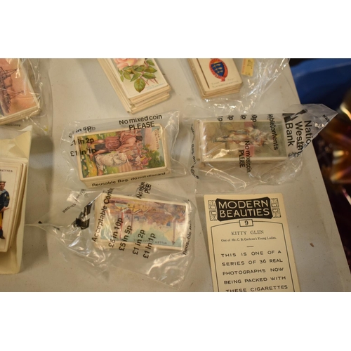 298 - A collection of 20th century cigarette and tea cards to include silk examples, Wills etc (mainly WWI... 