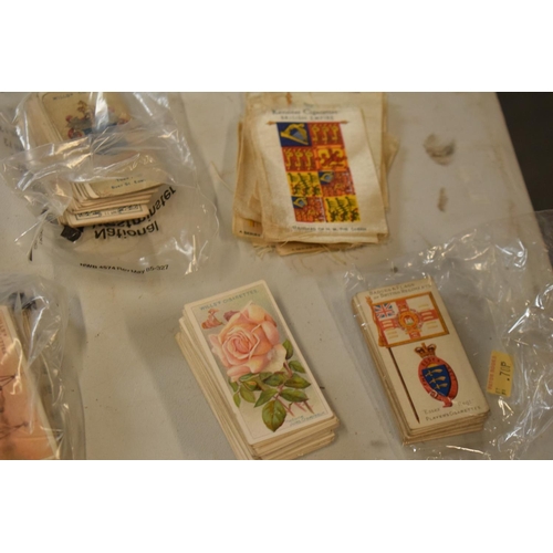 298 - A collection of 20th century cigarette and tea cards to include silk examples, Wills etc (mainly WWI... 