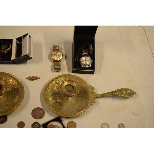 299 - A mixed collection of items to include watches, brass candle holders, uk and other coinage to includ... 