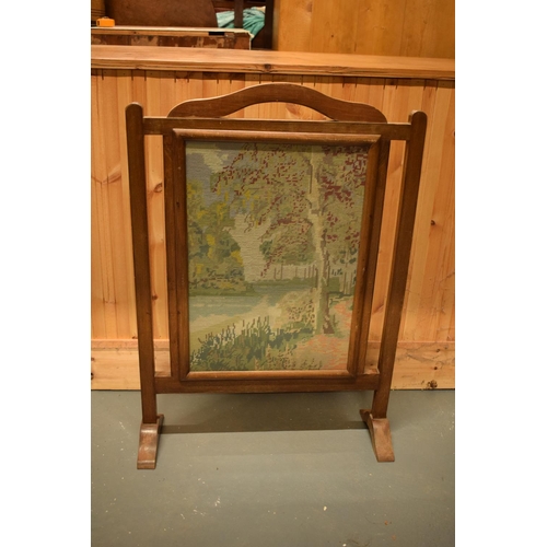 303 - A wooden tapestry fire screen together with an early Victorian copper hot pan (2).