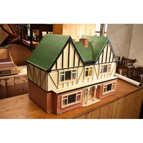 304 - Large 20th century wooden dolls house with 6 rooms, opens from the back. With electrics which will n... 