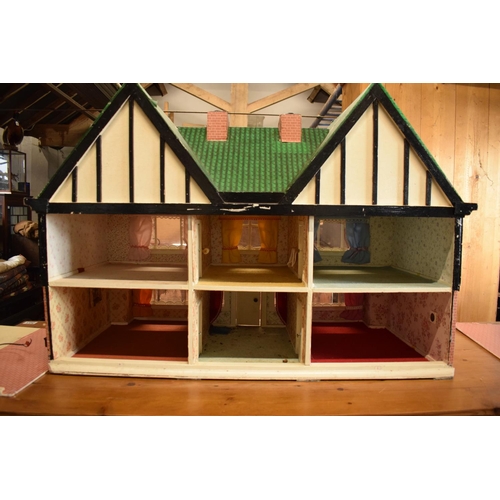 304 - Large 20th century wooden dolls house with 6 rooms, opens from the back. With electrics which will n... 