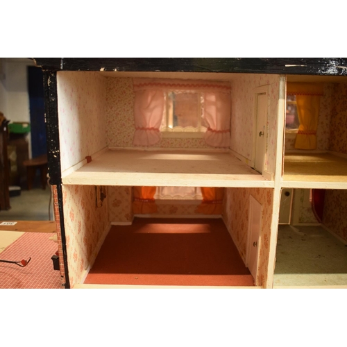 304 - Large 20th century wooden dolls house with 6 rooms, opens from the back. With electrics which will n... 