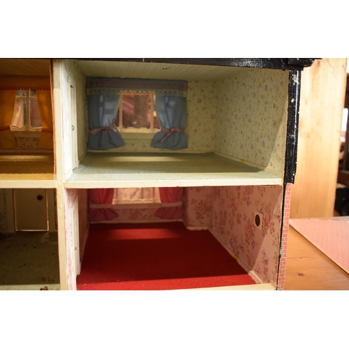 304 - Large 20th century wooden dolls house with 6 rooms, opens from the back. With electrics which will n... 