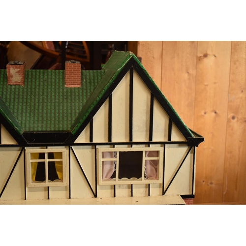 304 - Large 20th century wooden dolls house with 6 rooms, opens from the back. With electrics which will n... 