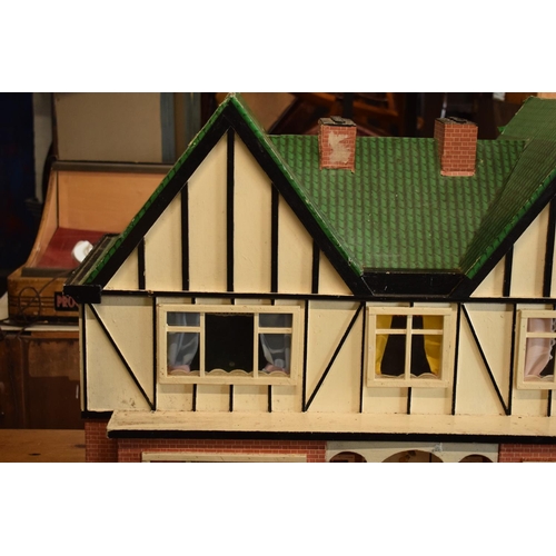 304 - Large 20th century wooden dolls house with 6 rooms, opens from the back. With electrics which will n... 