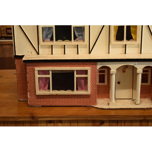 304 - Large 20th century wooden dolls house with 6 rooms, opens from the back. With electrics which will n... 