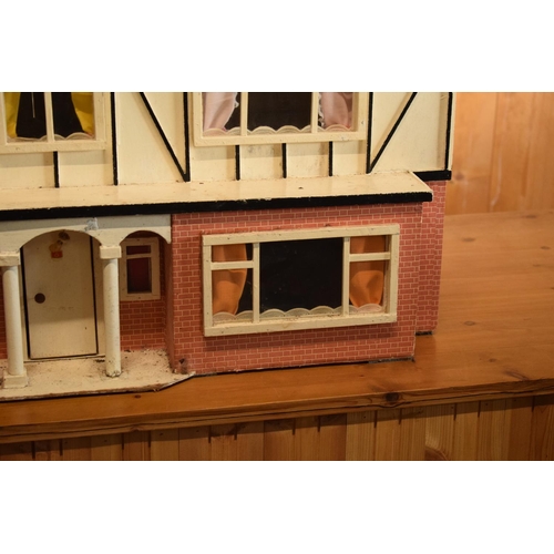 304 - Large 20th century wooden dolls house with 6 rooms, opens from the back. With electrics which will n... 