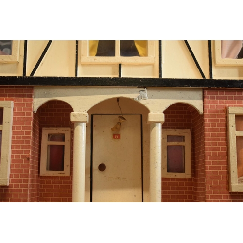 304 - Large 20th century wooden dolls house with 6 rooms, opens from the back. With electrics which will n... 