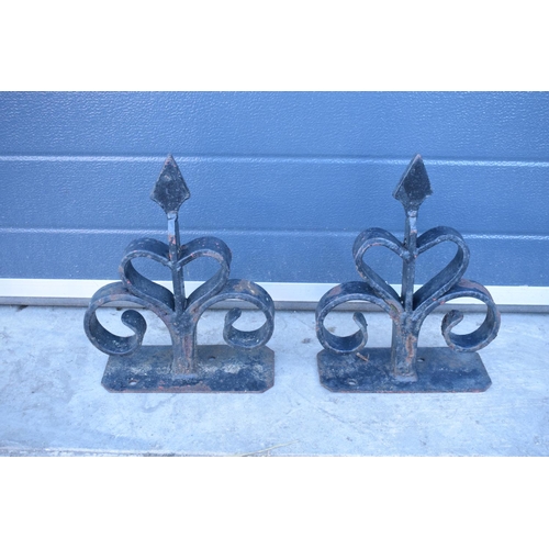 311 - Estate made blacksmiths ornate gatepost finials (2). In good condition with some loss of paint.