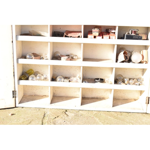 313 - Royal Ediswan Motor Lamb Bulbs workshop cabinet complete with contents. This is piece is in honest a... 