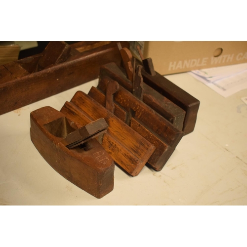 319 - A collection of early 20th century wood working planes, in mixed condition, some incomplete.