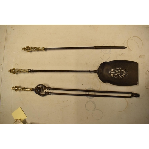 328 - Brass and metal fire companion set (heavy duty). No postage, condition reports or extra photos are a... 