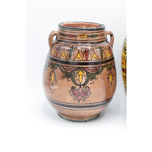 52 - A pair of Moroccan 'Safi' vases: one with handles. We believe the rims have been repainted/ touched ... 