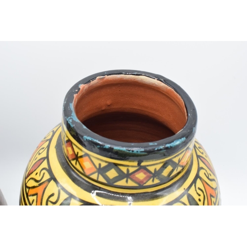 52 - A pair of Moroccan 'Safi' vases: one with handles. We believe the rims have been repainted/ touched ... 